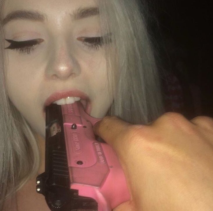 Blond teen blowjob with gun