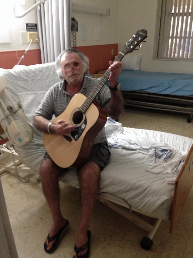 Ron Poppo, say his doctors, has gained 50 pounds over the past year and is relearning the guitar. 