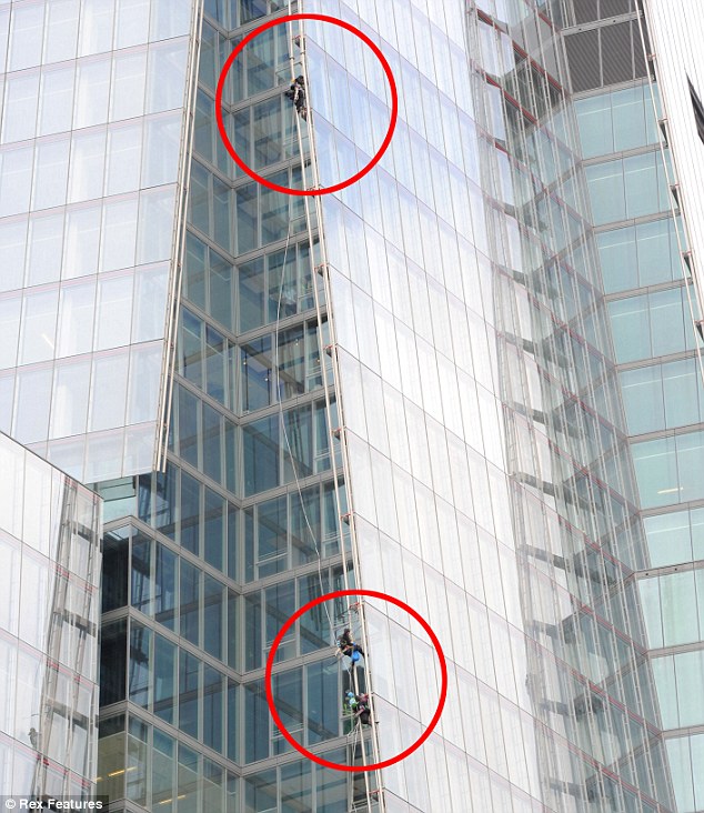 Shard showdown: Greenpeace activists scale Britain's tallest building in protest at drilling in the Arctic 