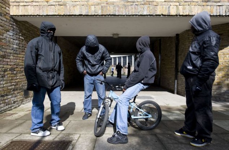 Gang members posing in Brixton, a majority Black area in London