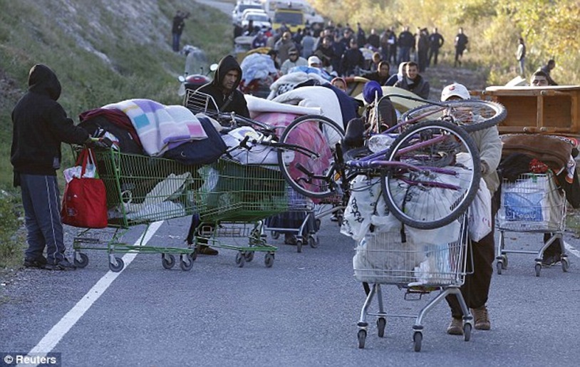 Roma removal lorries leaving their illegal camp near the Var river in Nice