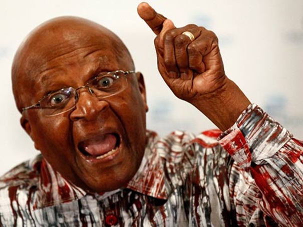 Desmond Tutu, known for using a pair of eyes stolen from the white man, has had his house broken into by Black burglars while he was attending his White hating terrorist buddy Mandela's funeral.