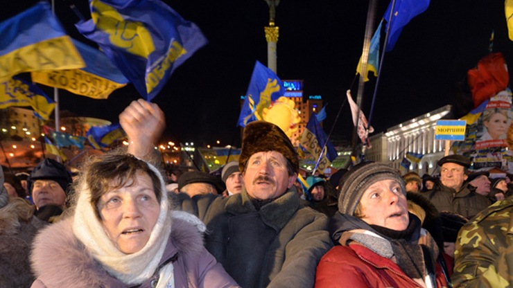 Gullible Ukrainians wave flags supporting the European Unions destabilisation of their country.
