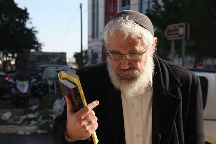 Rabbi Mordechai Elon arrives at Jerusalem Magistrates Court to hear his sentence.