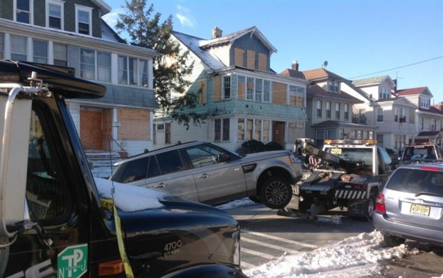 The rangerover that was carjacked being towed from a Newark garage where it was found.