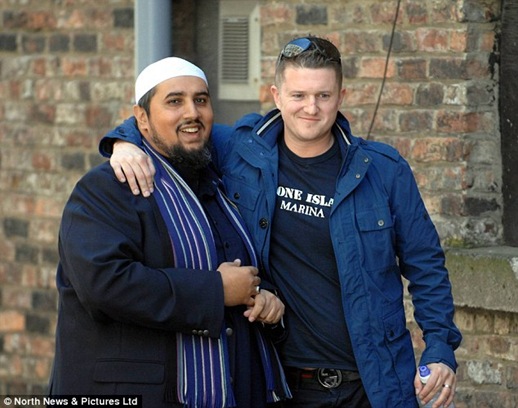 The former EDL leader, pictured with political and social commentator Mohammed Ansar, has pledged to fight racism