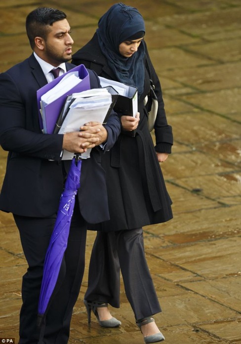 The jury heard Hanif, here leaving court with her solicitor, set up three companies with her co-accused to pressurise victims into claiming compensation