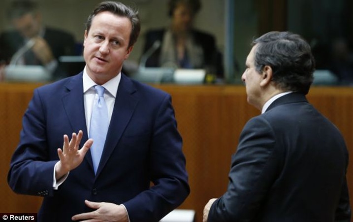 David Cameron, pictured talking to Mr Barroso at an EU summit, hopes to get more power over Britain¿s borders as part of a re-negotiation of European treaties