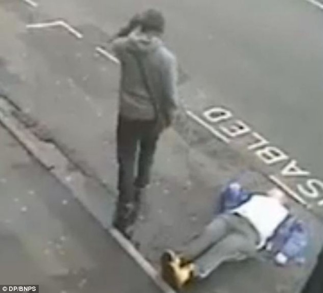 Gill, 20, can be seen to walk away after looking back to see his victim lying motionless on the ground