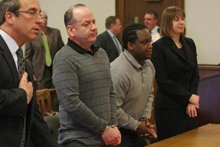 Accused arsonists Mark Sargent (left) and Jeanmarie Louis were flanked by their lawyers, Edward Sharkansky and Jennifer Sunderland, in Plymouth Superior Court Tuesday.