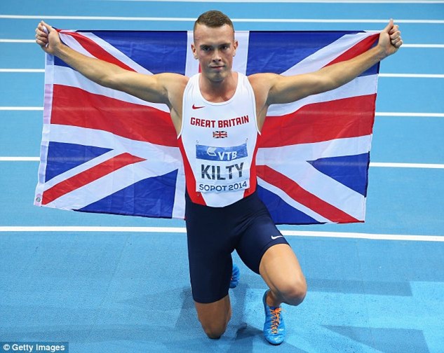 Richard Kilty of Great Britain celebrates winning the gold medal in the 60m