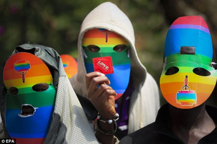 The new legislation, passed this week, have criminalised the 'promotion of homosexuality'. Activists have blasted the laws but, facing life-imprisonment, cannot show their faces