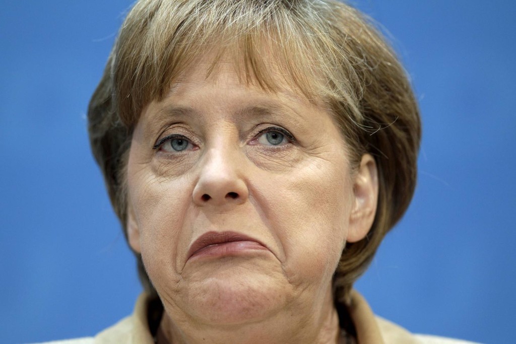 The overweight dog-faced dyke Merkel was at first concerned that she would not be able to secure gyros if Greece left the Eurozone.