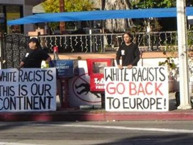2142794472_aa_white_anti_white_racists_holding_signs_xlarge