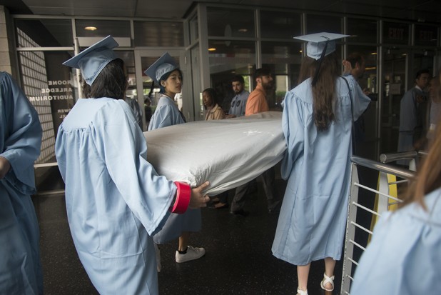 Bringing a mattress to a graduation, in memory of an imaginary crime