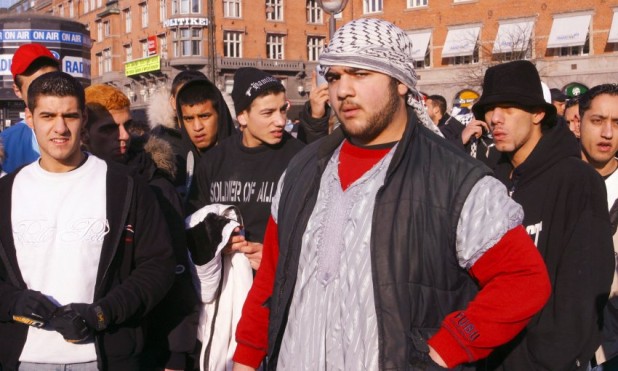 Disgruntled Muslim protesters gather on City Hall Square in Copenhagen, Denmark Saturday Feb. 4, 2006. Denmark, a small country that prides itself on extensive humanitarian work and that usually gets only cursory media attention suddenly finds itself denounced as evil for publishing 12 cartoons of the Prophet Muhammad. Muslims in Denmark _ some 200,000 of the country's 5.4 million people _ complain of being discriminated against and being denied jobs.  (AP Photo/John McConnico)