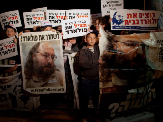 JERUSALEM, ISRAEL - MARCH 19:  (ISRAEL OUT) Israelis protest against US President Barack Obama as they call for the release of Jonathan Pollard, a Jewish American who was jailed for life in 1987 on charges of spying on the United States, during a demonstration outside the Israeli President's residence on March 19, 2013 in Jerusalem, Israel.  Obama will make his first visit as President to the region tomorrow, and his itinerary will include meetings with the Palestinian and Israeli leaders as well as a visit to the Church of the Nativity in Bethlehem. (Photo by Uriel Sinai/Getty Images)