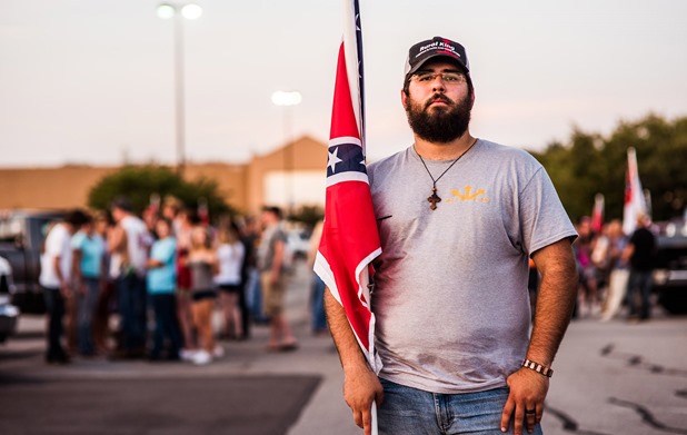 Mathew Heimbach, poses for portrait at a confederate flag rally that ended in a parking lot in Knoxville, Tennessee after motorcading through the city on Thursday, July 17, 2015. Host Tom Pierce, and guest, Mathew Heimbach delivered speeches at the meeting place in Seymour, Tennessee before prompting the group to drive through the city with flags raised. Mike Belleme for Al Jazeera America 