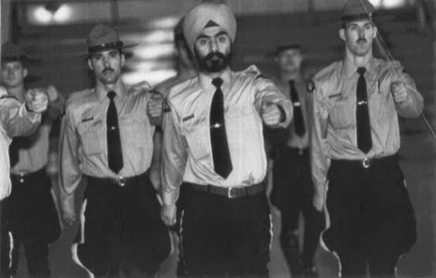 Mounties+wearing+hats+and...turban..