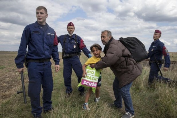 A simple Syrian refugee with his clock boy son who only wants to get to Germany to build clocks and get free stuff