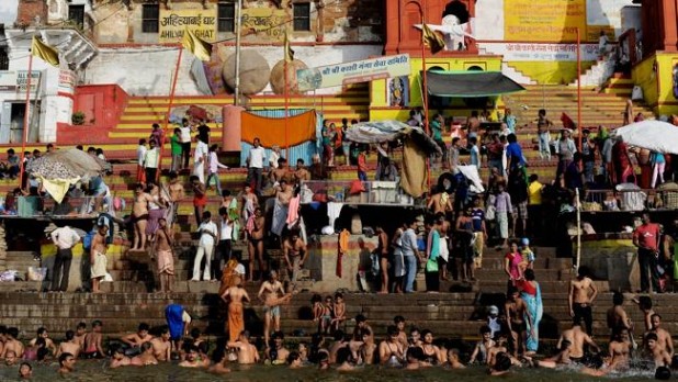 Any one of these people bathing in the same river they defaecate in, which is also filled with floating corpses, could be the next head of some important government institution. After all, a man swimming in his own feces is no different than some White guy working in Silicon Valley. Actually he is different because he's vibrant and not evil.