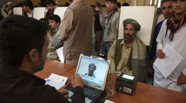 Afghan man applying for a passport in Kabul--next stop Europe!