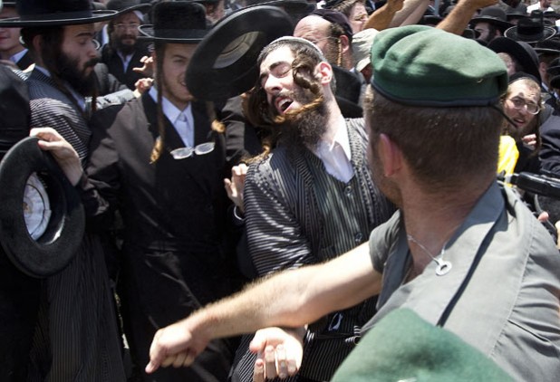     An atheist Israeli holocausts a fellow Jew.