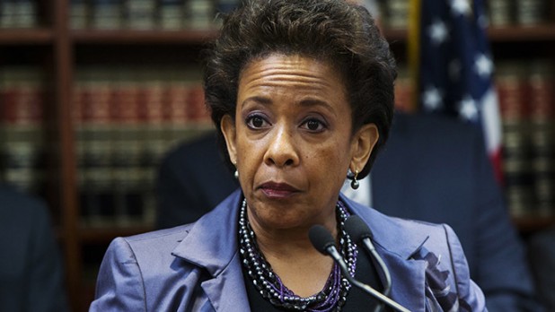 Attorney General Loretta Lynch has announced that she has not ruled out using African voodoo rituals against the family of the dead racist cop who abused the unarmed teen.