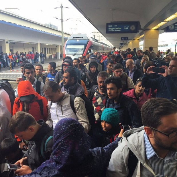 Migrants arrive at the train station in Vienna, Austria on September 6, 2015.