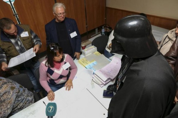 Darth Vader visits a polling station during a regional election in Odessa, Ukraine, Oct. 25, 2015. 