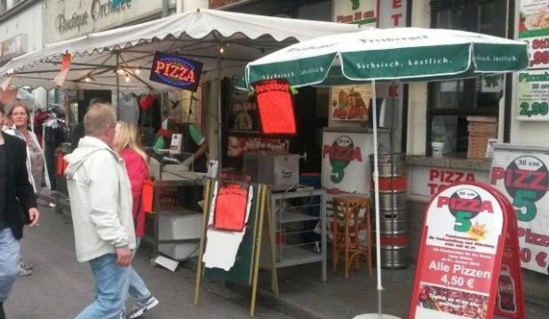 A pro-migrant, open borders activist is reported to be “very sad” after being stabbed twice in the back by a gang of “Arabs” as he stood outside a pizzeria in Dresden, east Germany.
