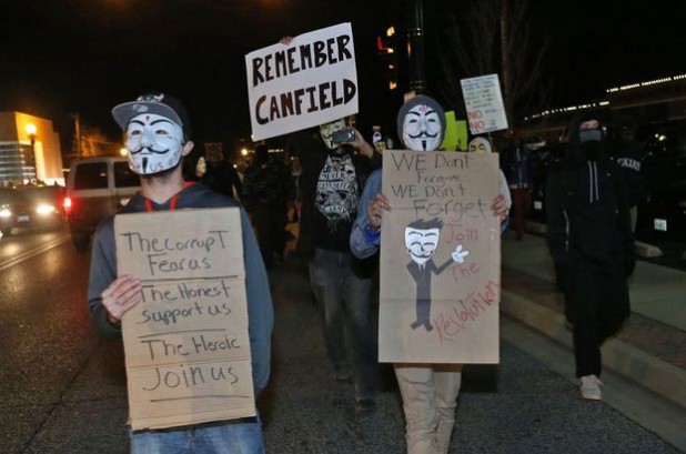 Yes, these are White people marching in fag-masks in support of Blacks killing Whites.