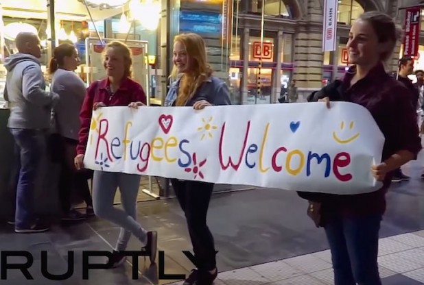 Refugees-Welcome-sign-germany-RuptlyYoutube