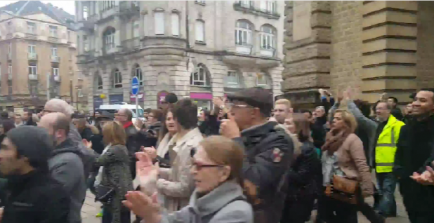 These White women are clapping at the arrest of White men attempting to defend the nation from conquest.