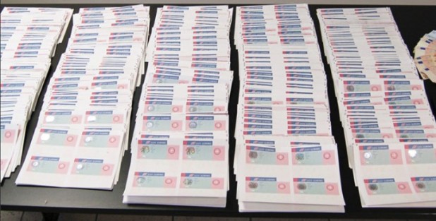 Fake blank residence permits, seized from a Chinese shipment to a Pakistani-run minimarket in the Athens district of Rendi.