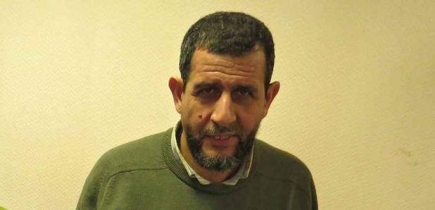 Hassan El Alaoui certainly looks like a typical terrorist.