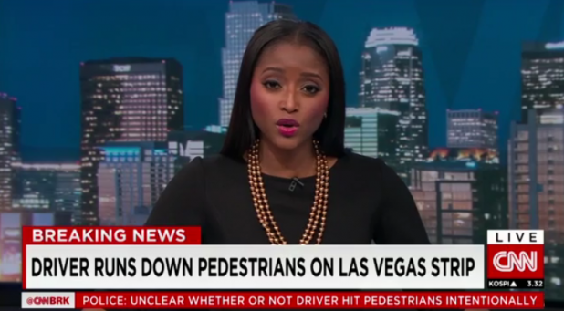 No wait. That isn't the driver. This woman is a CNN newsperson for some reason. 