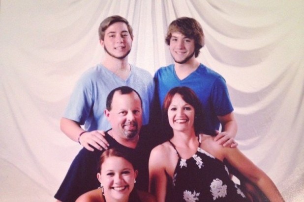 Anthony Tardo, seated, with his wife, Melissa, and his triplets, Joey, Chris and Danielle. 