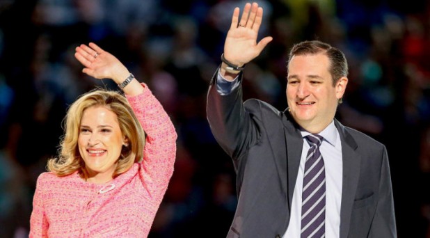 Sen. Ted Cruz, second from right, R-Texas, his wife Heidi, and their two daughters Catherine, left, 4, and Caroline, 6, wave on stage after he announced his campaign for president, Monday, March 23, 2015, at Liberty University, founded by the late Rev. Jerry Falwell, in Lynchburg, Va. Cruz, who announced his candidacy on twitter in the early morning hours, is the first major candidate in the 2016 race for president. (AP Photo/Andrew Harnik)