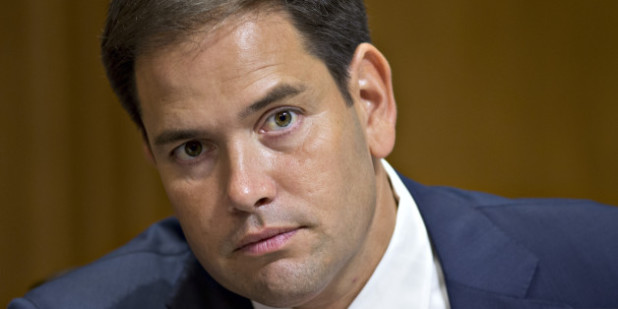 Sen. Marco Rubio, R-Fla., attends a Senate Foreign Relations Committee hearing on the nomination of Victoria Nuland to be assistant secretary of State for European and Eurasian affairs, on Capitol Hill in Washington, Thursday, July 11, 2013. (AP Photo/J. Scott Applewhite)