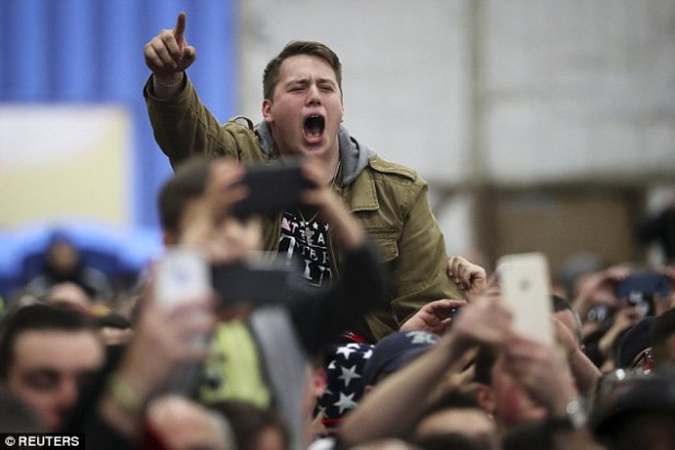 32EAB89A00000578-3527465-PASSION_Trump_s_fans_brought_a_hockey_fan_atmosphere_with_them_s-a-66_1460009091740
