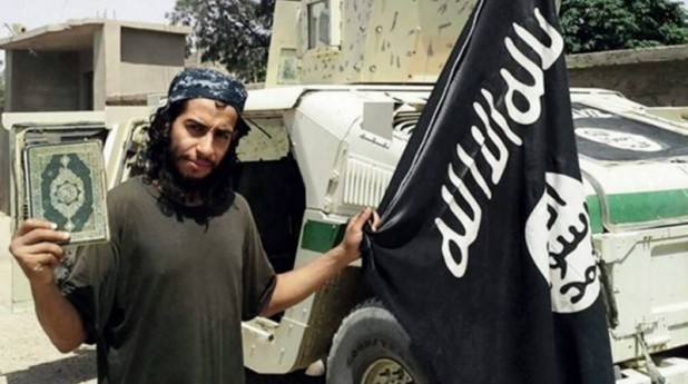 Abdelhamid-Abaaoud-the-architect-of-the-attacks-in-Paris-holding-an-ISIS-flag