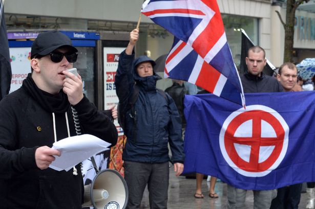 Alex-Davies-National-Action-leader-with-megaphone