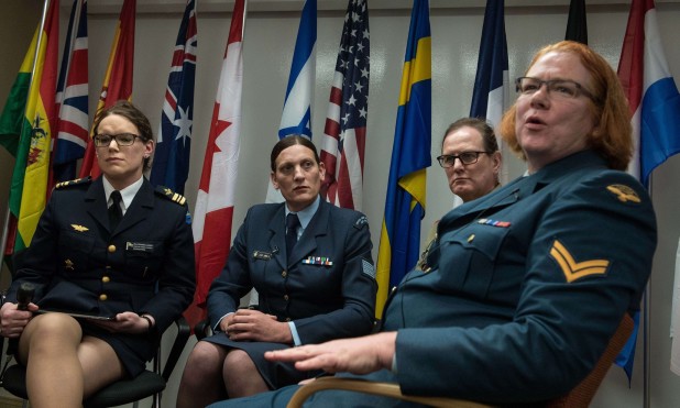 (From L to R), transgenders Major Alexandra Larsson of the Swedish Armed Forces, Sergeant Lucy Jordan of the New Zealand Air Force and Major Donna Harding of the Royal Australian Army Nursing Corps listen to Corporal Natalie Murray of the Canadian Forces speak during a a conference entitled "Perspectives on Transgender Military Service from Around the Globe" organized by the American Civil Liberties Union (ACLU) and the Palm Center in Washington,DC on October 20, 2014. AFP PHOTO/Nicholas KAMMNICHOLAS KAMM/AFP/Getty Images