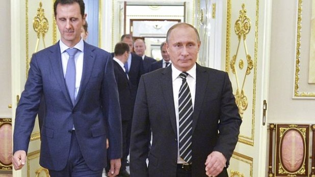 1452690338putin-assad