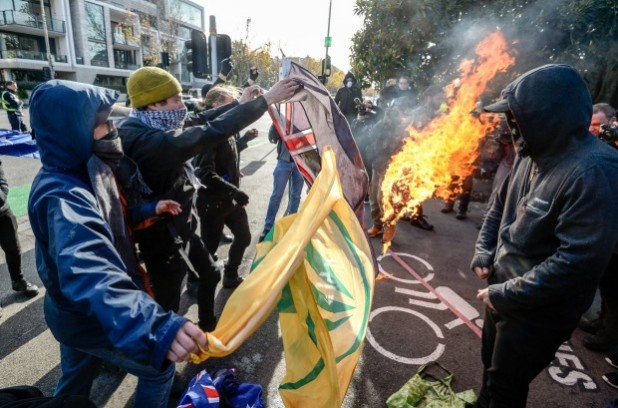 Burning flags brings us all closer together in a world without borders and prejudice