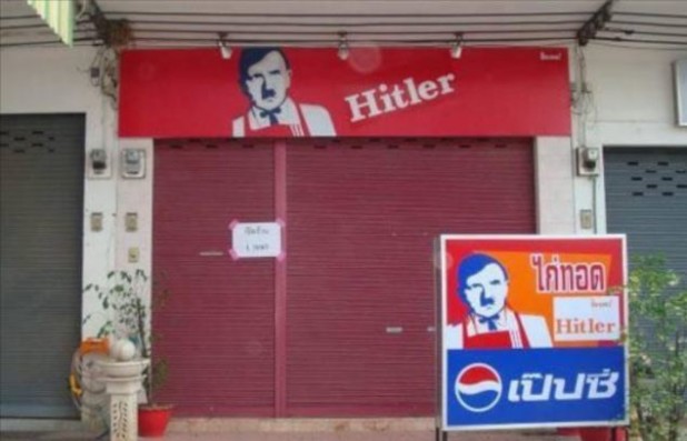 STIAN_HITLER FRIED CHICKEN_IMAGE001 A FRIED chicken takeaway called HITLER - complete with logo showing the Nazi leader in a bow tie - has opened its doors. The bizarre restaurant opened last month in Thailand and images of it are doing the rounds on Twitter as shocked customers take photos of the offensive eatery. The fascist dictator's head has been grafted onto the body of bow-tie wearing Colonel Sanders, the founder of KFC. STIAN ALEXANDER 07528 679198