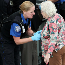 DENVER - NOVEMBER 22:  A traveler undergoes an enhanced pat down by a Transportation Security Administration agent at the Denver International Airport on November 22, 2010 in Denver, Colorado. The TSA is bracing for heavy traffic before the Thanksgiving holiday, as two separate internet campaigns are promoting a "National Opt-Out Day" protest during which travelers are urged to refuse the new body scanners because of concerns over privacy and possible exposure to radiation. Those passengers who refuse the scans must instead undergo an enhanced pat down by TSA agents, which could further slow down security lines on the busiest air travel day of the year.  (Photo by John Moore/Getty Images)   Original Filename: GYI0062581646.jpg