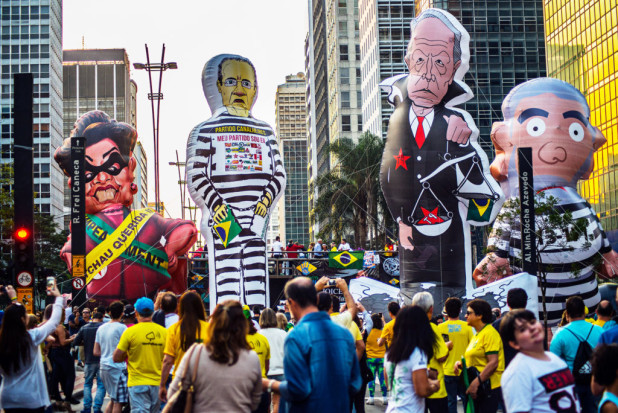 SAO PAULO, BRAZIL - JULY 31: Activists protest against suspended president Dilma Rousseff and former President Inacio Lula da Silva on July 31, 2016 in Sao Paulo, Brazil. Protesters took the streets to demand the final resolution of suspended President Dilma Rousseff. (Photo by Cris Faga/LatinContent/Getty Images)