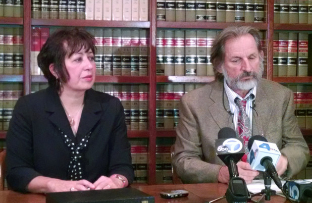 Sandra Troian, left, with her attorney Dan Stormer, talks during a news conference in Pasadena, Calif. on Thursday, Nov. 13, 2014. Troian a physics professor at the California Institute of Technology, sued the school Thursday, claiming she faced retaliation for telling the FBI that she suspected illegal activities at NASA's Jet Propulsion Laboratory. Troian alleges that Caltech officials violated the school's own whistle blower policy by conducting a campaign of retaliation to "drive her out of Caltech and ruin her career" after she reported possible violations of federal export laws at JPL, which is managed by Caltech. (AP Photo/Christopher Weber)